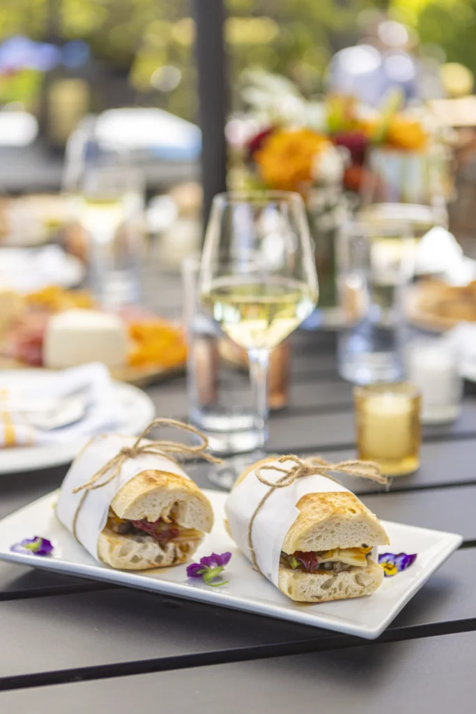 a plate with a sandwich on it sitting on a table