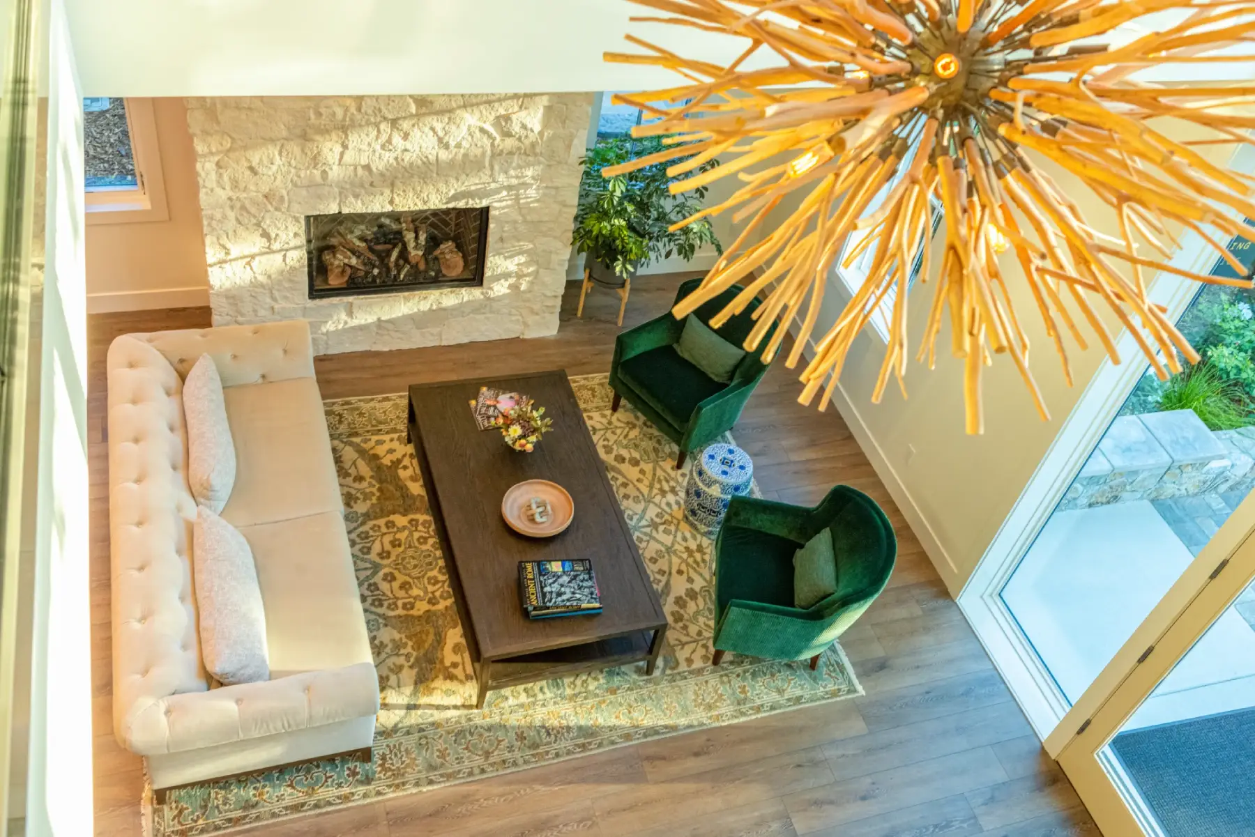a living room filled with furniture and a fire place