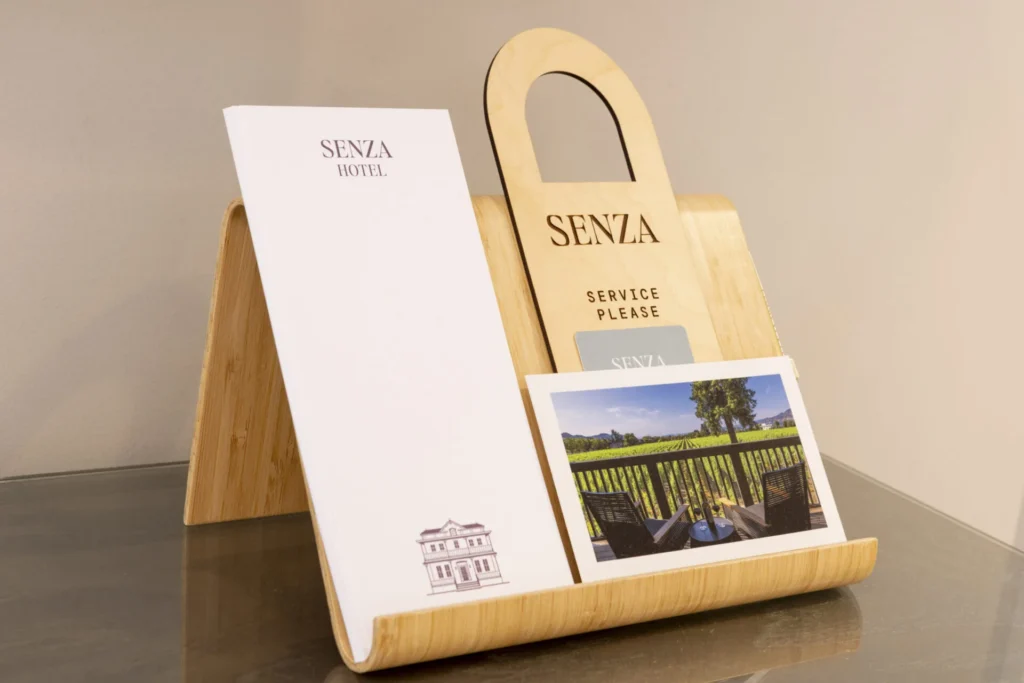 a wooden magazine holder with a picture of a park